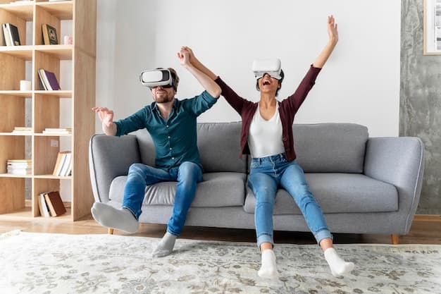 Two people enjoying VR headsets on a sofa at home